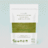 Organic moringa powder in container - natural superfood supplement rich in vitamins minerals and antioxidants"